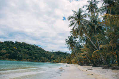 Scenic view of sea against cloudy sky