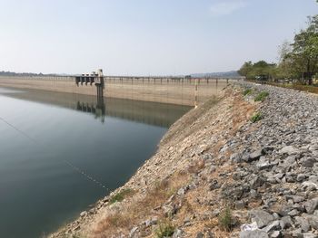 Scenic view of canal against clear sky