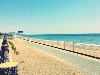 Scenic view of beach against clear sky