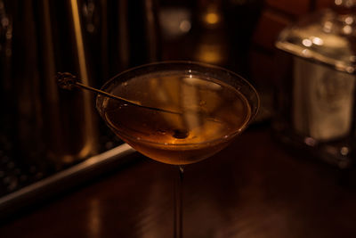 Close-up of martini in glass on table