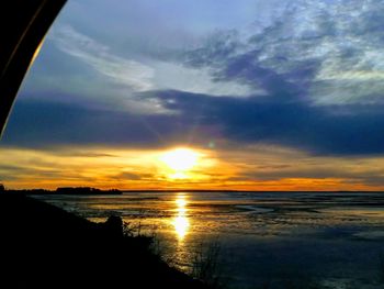 Scenic view of sea against sky during sunset