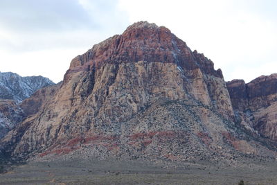 Scenic view of rocky mountains against sky