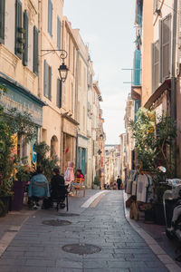 People walking on street in city