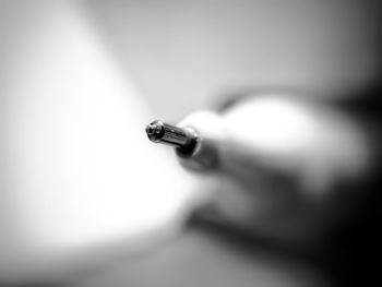 Close-up of cigarette on table