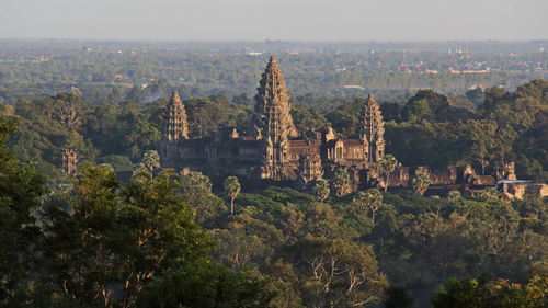 Panoramic view of old buildings and trees in city