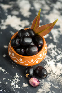 High angle view of fruits in bowl on table