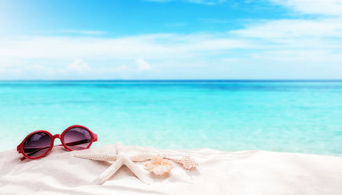 Scenic view of beach against sky