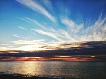 Scenic view of sea at sunset