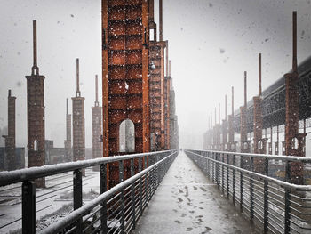 View of buildings in city during winter