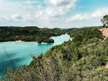 Scenic view of bay against sky