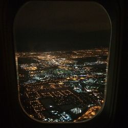 Aerial view of illuminated cityscape