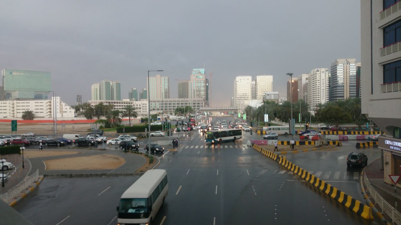 VIEW OF CITY STREET AGAINST SKY