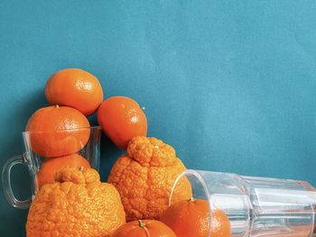 Close-up of orange fruits on table