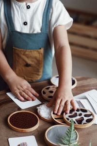 Midsection of woman preparing food