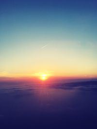 Scenic view of landscape against sky during sunset