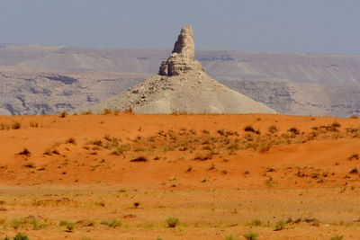 Scenic view of desert against sky