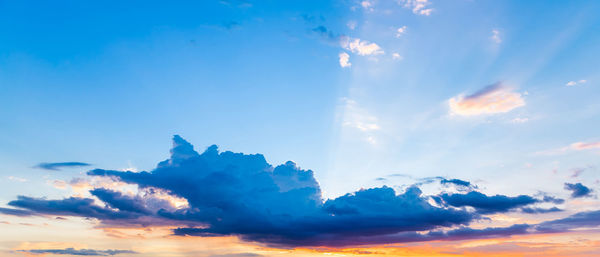 Low angle view of cloudscape against sky during sunset