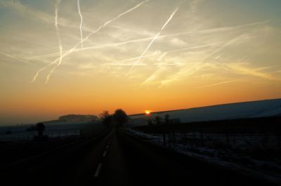 Road against sky during sunset