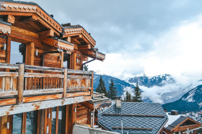 Building against cloudy sky during winter