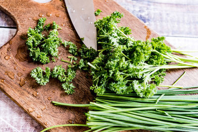 High angle view of vegetables on cutting board