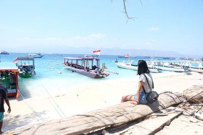 Girl enjoying blue water in gili trawangan