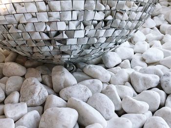 High angle view of stones in basket