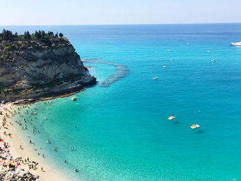 High angle view of sea shore against sky