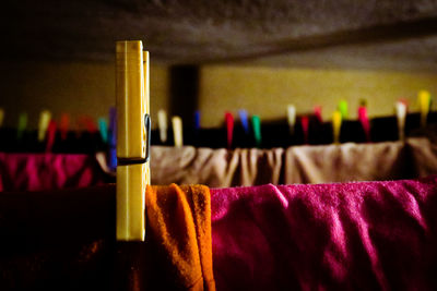 Close-up of clothespins on clothesline