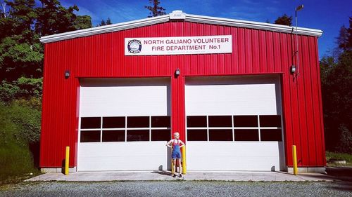 View of man with text on red wall
