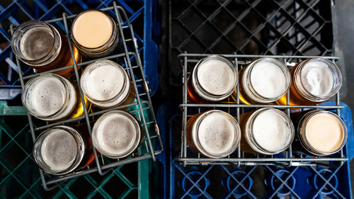 Directly above shot of glasses in metal container