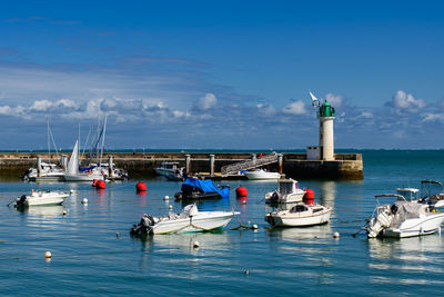 View on the phare de la flotte and some boats  from the beach plage de l' arnérault on a  summerday