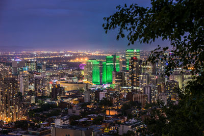 High angle view of illuminated buildings in city