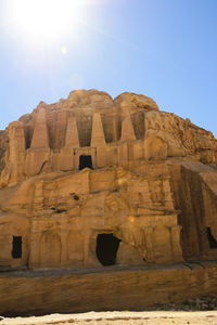 Low angle view of rock formation against clear sky