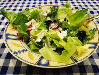 High angle view of vegetables in plate on table