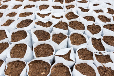 Full frame shot of soil in bags