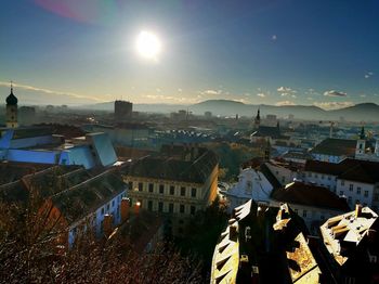High angle shot of townscape against sky at sunset