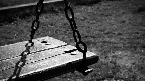 Close-up of swing in park