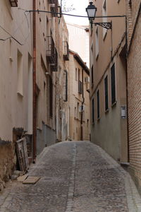 Narrow alley along buildings