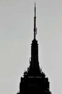 Low angle view of eiffel tower against clear sky