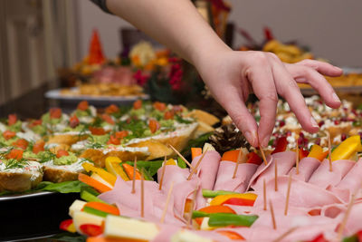 Midsection of woman preparing food