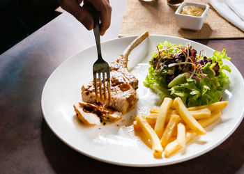 Close-up of food in plate on table