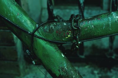Cropped image of abandoned bicycle with chain