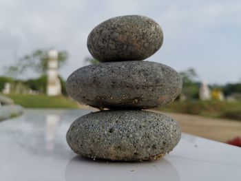 Close-up of stone stack on rock