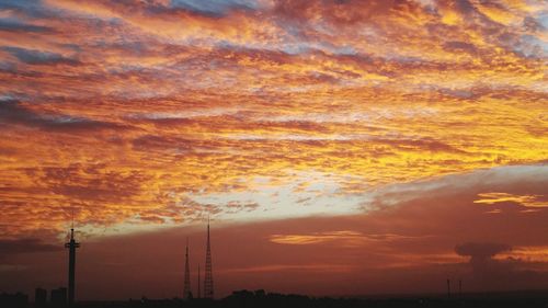 Low angle view of dramatic sky during sunset