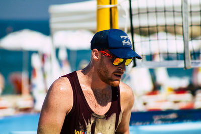 Young man looking away in swimming pool