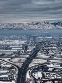 Aerial view salt lake city and mountains and highway