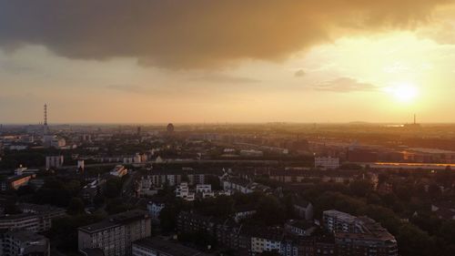 High angle view of townscape against sky during sunset