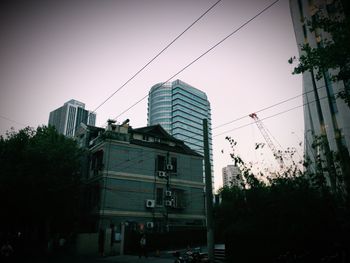 Low angle view of buildings against clear sky