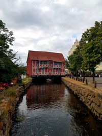 River by building against sky