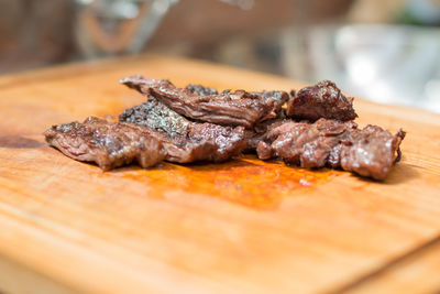 Close-up of meat on cutting board